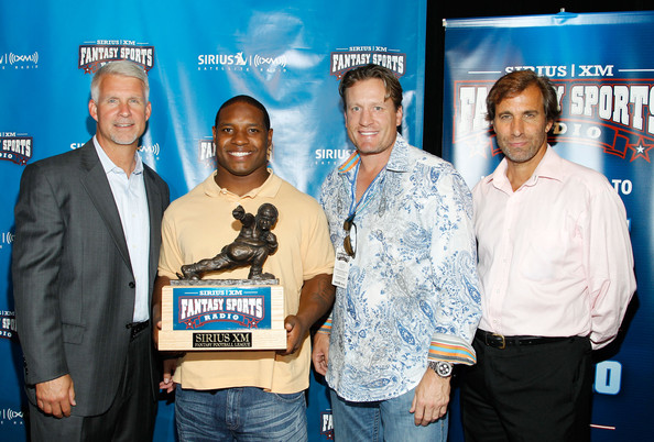 siriusxmradiocelebrityfantasyfootballgskhqoxxetll Steve Phillips, Maurice Jones-Drew, Jeremy Roenick and Mad Dog Russo with the Throwback fantasy football trophy